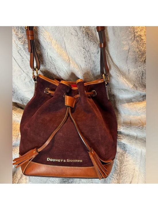 Dooney & Bourke Handbags - Dooney & Bourke - Suede Drawstring Bucket Bag - EUC 
Dark Brown/Burgundy Color